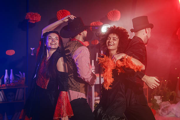 istock Having fun and dancing in costumes during a Halloween party 2213024870