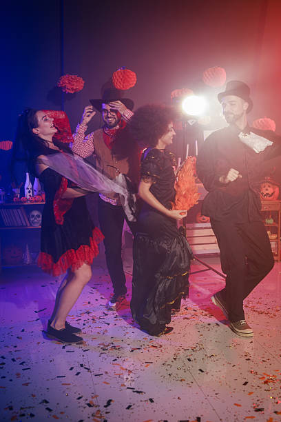 istock Having fun and dancing in costumes during a Halloween party 2213024871