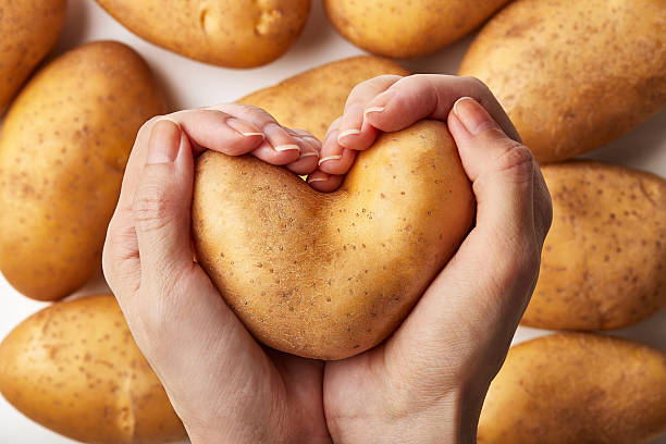 Potato heart shape hands
