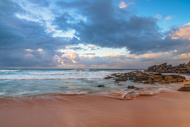 Moody sunrise seascape at Killcare Beach on the Central Coast of NSW, Australia.