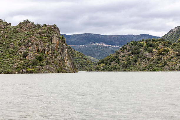 Between hills and mountains the Douro river with the reflection on the water in Foz Tua, Trás os Montes Portugal