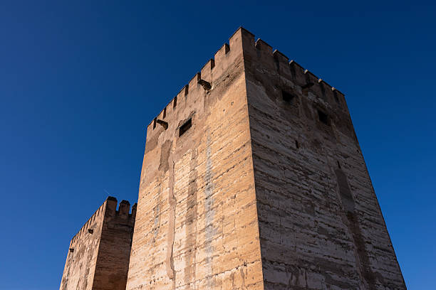 Granada, Spain - aug 19, 1993: view of the Alcazaba, the fortified wall including turrets and walls which had the function of protecting the city of Granada