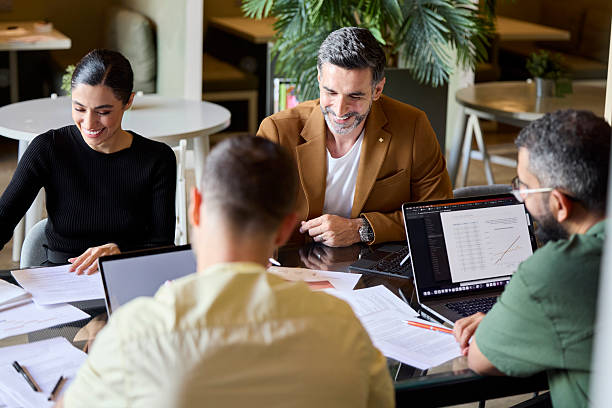 istock Business professionals working together at office 2213038200