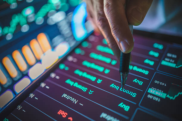 istock hand pressing buy recommendation on high-tech trading dashboard with glowing green indicators, financial analytics, and digital interface, modern fintech 2213049713