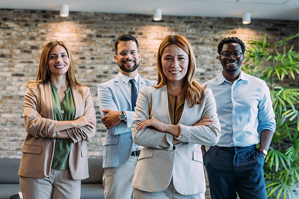 istock Confident businesswoman and her team. 2213051677