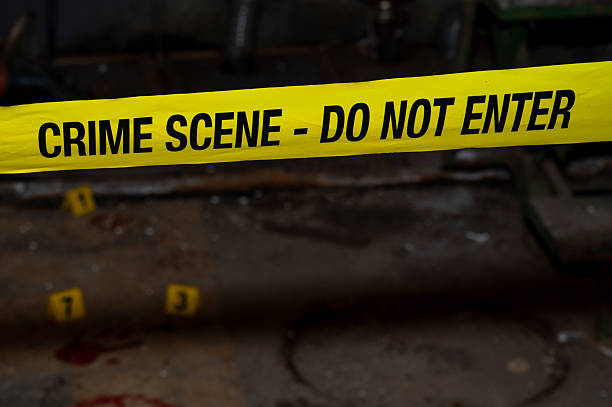 istock Forensic Crime Scene Investigation with Bloodstains and Numbered Markers 2213052049