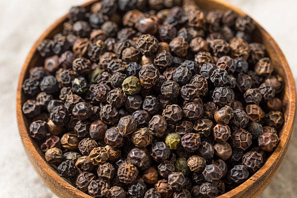 istock Organic Dry Raw Black Peppercorns 2213054076