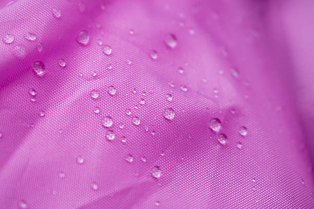 Colourful raindrop, abstract macro photo