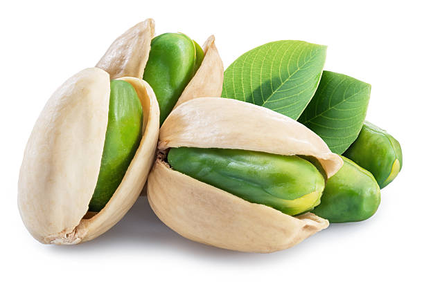 istock Green pistachio nuts with pistachio shell isolated on a white background. Clipping path 2213059529