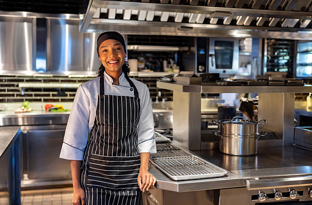istock Happy chef smiling in the kitchen at a restaurant 2213060185
