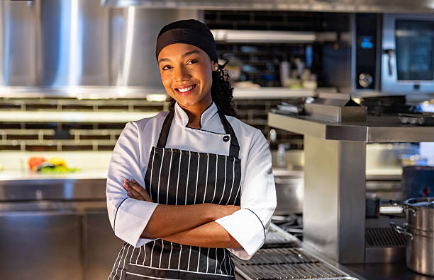 istock Beautiful chef in the kitchen at a restaurant 2213060207