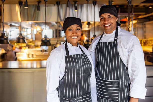 istock Happy chefs smiling at a restaurant 2213060254