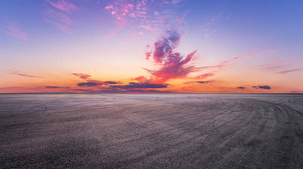 istock Asphalt road and beautiful sky clouds nature landscape at dusk 2213060965