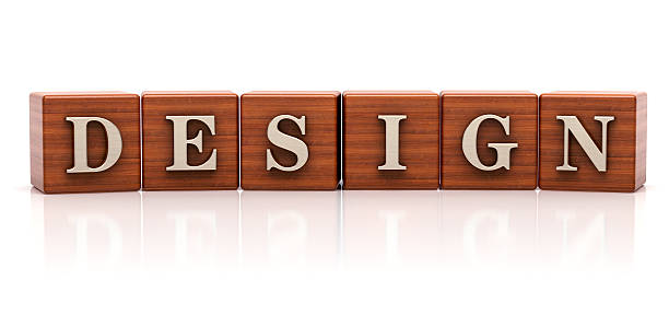 Design word written on wooden cube