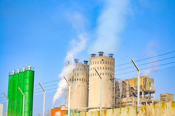 Industrial chemical plants zone chemical factory,Fossil fuel coal burning electrical power plant against blue skies scenery,Devnia industrial zone,Bulgaria,