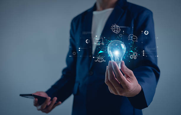 istock Human hand holding light bulb to illuminate. Innovation through ideas and inspiration ideas. idea of creativity and inspiration concept of sustainable business development. 2213068739