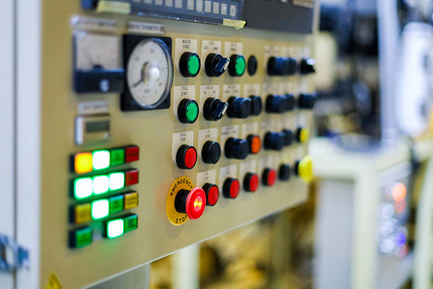 Control panel of machine in the manufacture. Button and selector switch of machine.