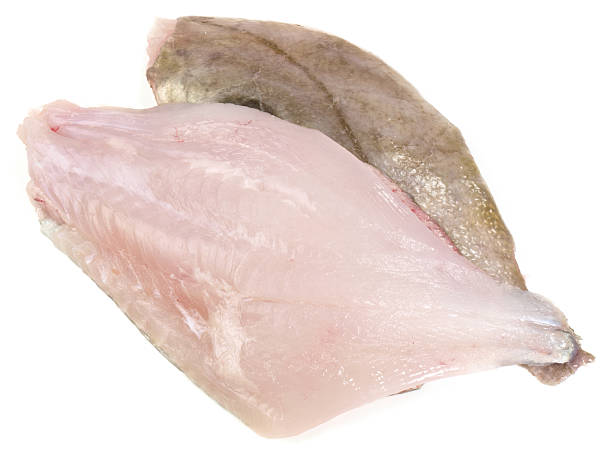 istock St. Pierre Fish Fillet raw on white Background 2213072942