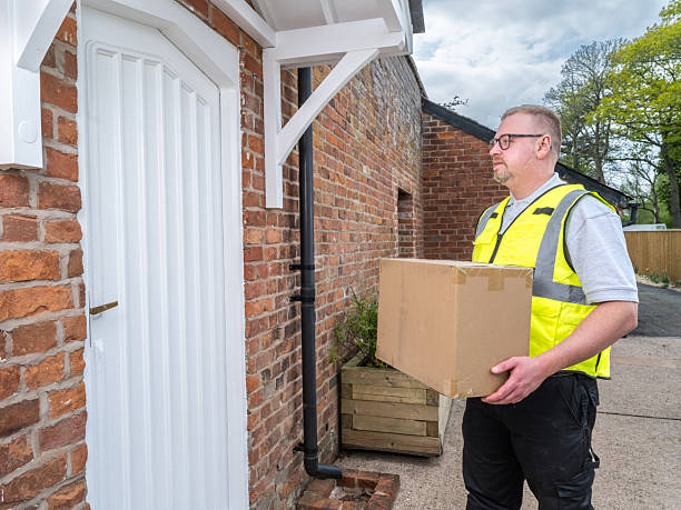 istock Courier Delivering to Rural House 2213074889
