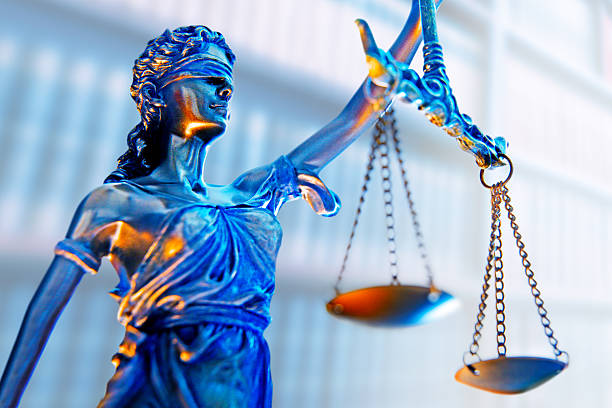 statue of Lady Justice, goddess Justitia with white background
