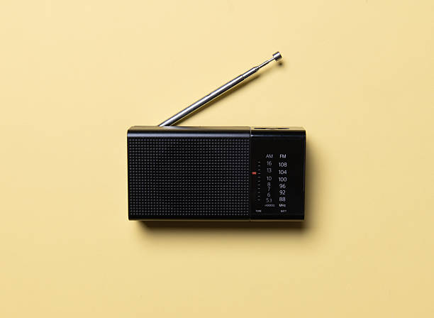 istock Retro black radio on yellow background 2213082550