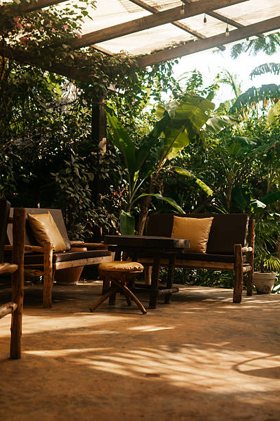 istock Tropical restaurant hotel table and chairs 2213086409