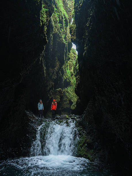 istock Two women bonding exploring canyon in Iceland 2213088522