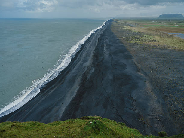 istock Dramatic landscape of black sand beach in Iceland 2213088907