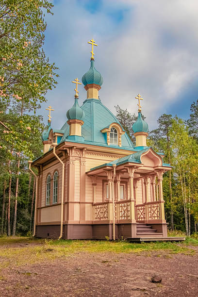 istock wooden church with blue domes 2213089082