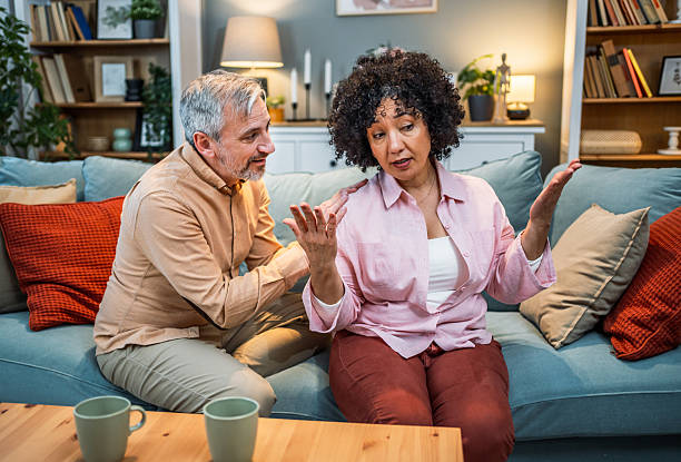 istock Mature couple having a serious conversation at home 2213089311