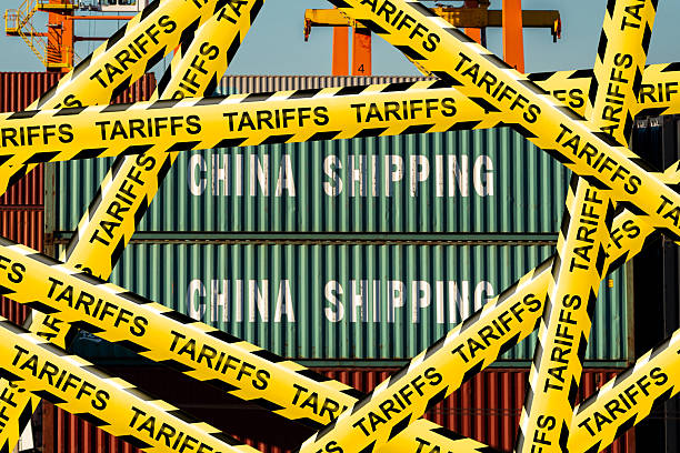 istock Tariff Warning Tape at Shipping Port 2213090783