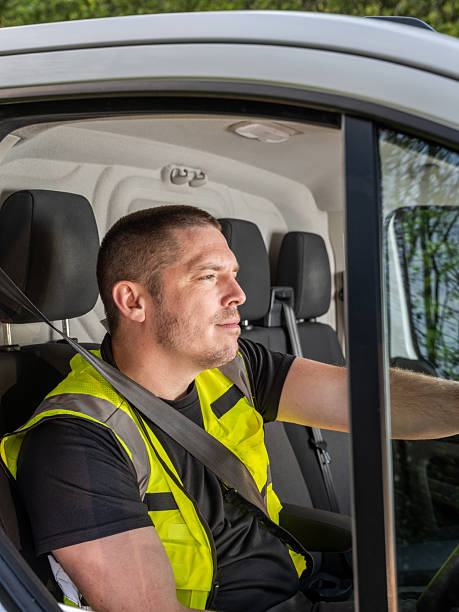 istock Focused British Van Driver in Hi-Vis Vest 2213101105