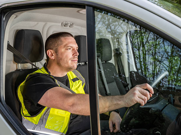 istock Focused British Van Driver in Hi-Vis Vest 2213101111