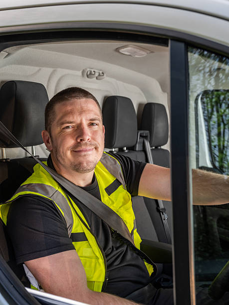 istock Smiling British Van Driver in Hi-Vis Vest 2213101146