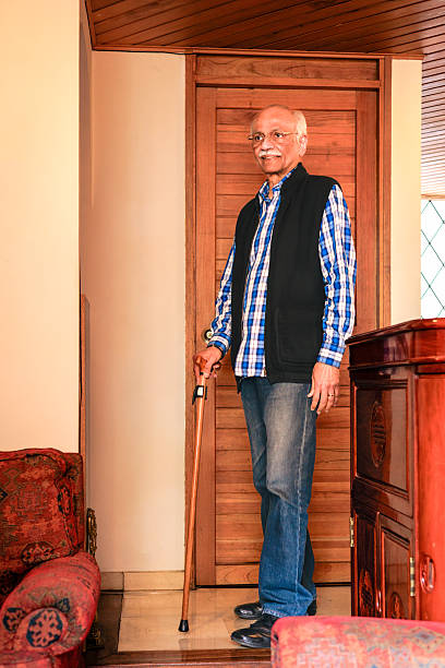 istock 77-Year-old Indian Man With Walking Cane 2213102949
