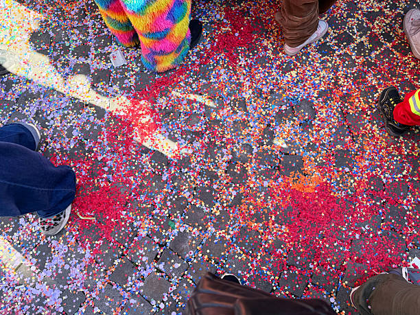 istock Colorful confetti scattered on the ground with textured background during a festive celebration, party decorations, joyful atmosphere, vibrant colors creating a lively and festive environment, fun-filled celebration scene. 2213106841