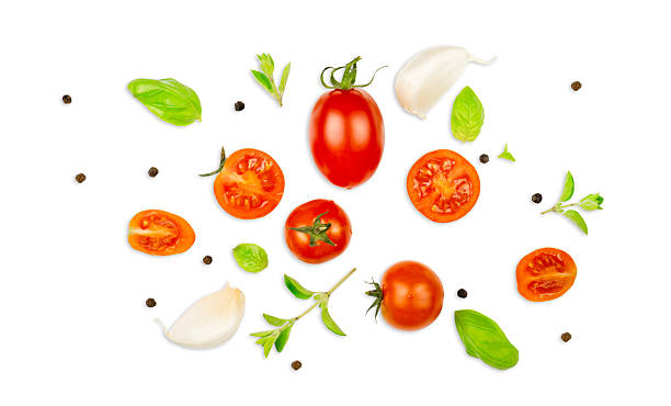 istock Top View of Fresh Tomato, Basil, Garlic and Pepper on White Background 2213109463