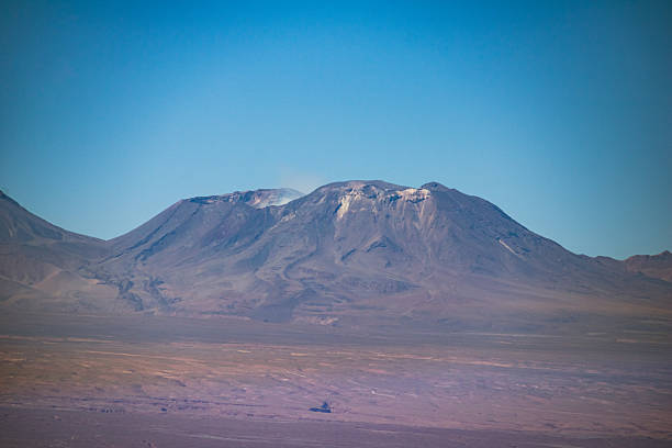 Lascar Volcano appears over the dry plains of the Atacama, showcasing Chile’s powerful volcanic geography.