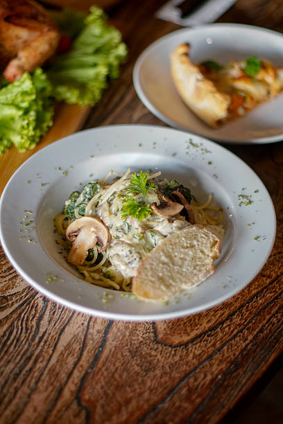 istock Spaghetti with bread mushrooms and parsley 2213119493