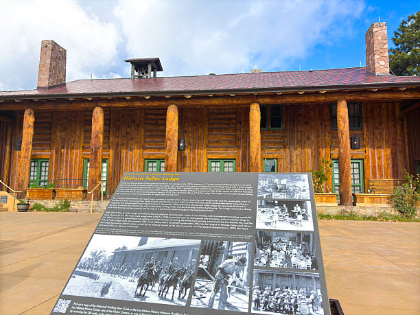 Los Alamos, NM: An information sign at the historic Fuller Lodge, designed by architect John Gaw Meem. Originally a schoolhouse, the building became a dining hall and community center for the Manhattan Project during WWII.