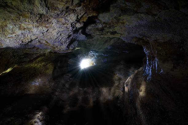 istock Sunbeams illuminating dark abandoned mine in hidalgo, mexico 2213122244