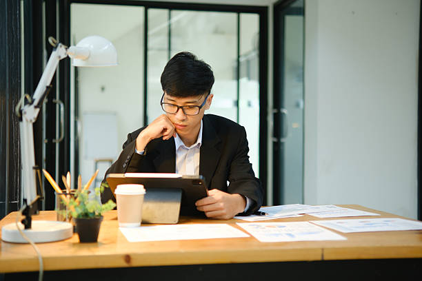 istock Business consultant analyzing financial data and investment plans 2213129763