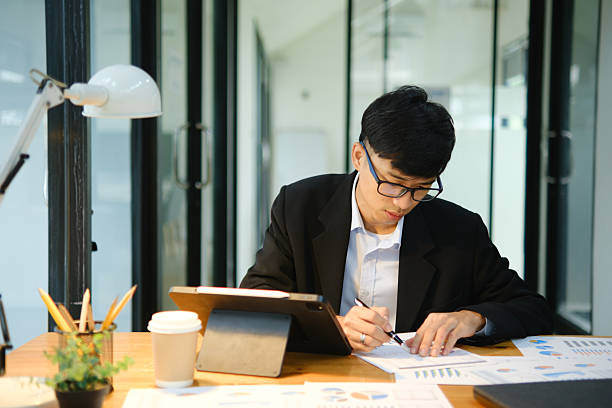 istock Business consultant analyzing financial data and investment plans 2213129766