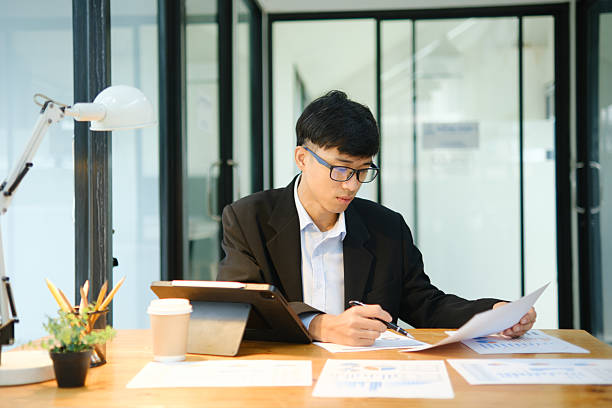 istock Business consultant analyzing financial data and investment plans 2213129777