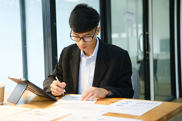 istock Business consultant analyzing financial data and investment plans 2213129784