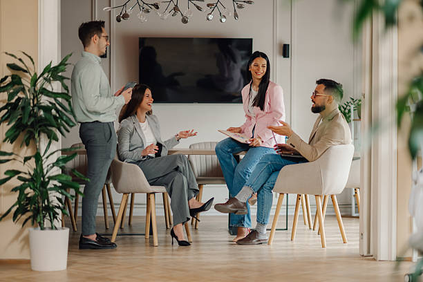 istock Business team discussing strategy during meeting in modern office 2213130051