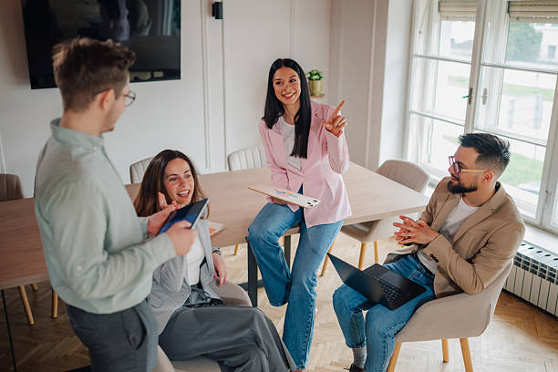 istock Young professionals collaborating on a project in a modern office 2213130060