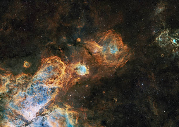 Under a dark and clear Southern Hemisphere sky, the Orion nebula shines brightly amongst surrounding stars.