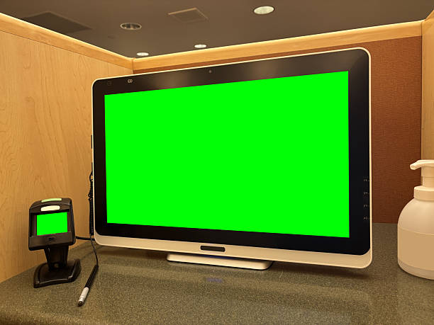 A Green Screen Hospital or Hotel Check in Computer for Corner Pin