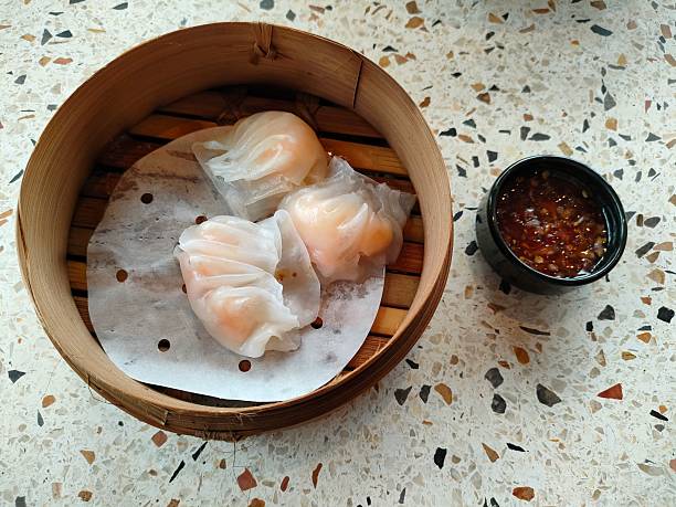istock Steamed Shrimp Dumplings with Spicy Dipping Sauce 2213133751